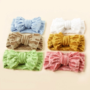 Lot de 6 bandeaux élastiques pour bébé avec nœuds texturés aux couleurs assorties