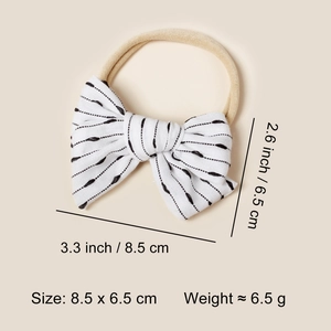 Soft nylon baby headband with striped white cotton bow measuring 8.5 cm by 6.5 cm