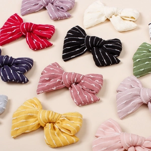 Barrettes à cheveux à nœuds rayés pour filles en diverses couleurs comme le violet et le rouge