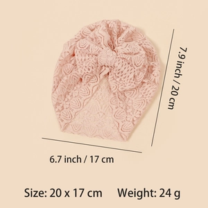 Breathable pink lace newborn turban hat with oversized bow and elastic fit design