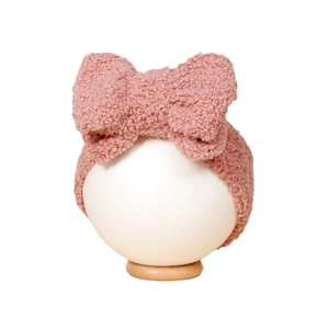 Rosa Teddy-Fleece Haarband mit großer Schleife für Kinder, auf weißem Hintergrund präsentiert