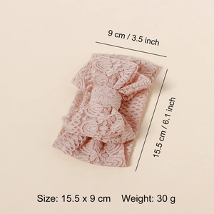 Soft pink embroidered lace baby headband featuring a double-layered bow for newborns