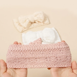 Elastic lace baby headbands with embroidered bows in pink, white, and beige colors