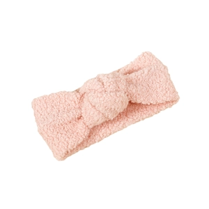 Weiches hellrosa Baby Stirnband aus Lammwolle mit elastischem Knotendesign auf Weiß