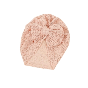 Breathable light pink newborn turban hat with floral lace pattern and large bow decoration
