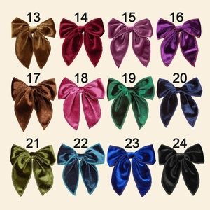 Selection of 12 velvet swallowtail bow hair clips in various elegant colors with numbers