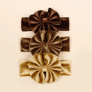 Lot de trois bandeaux en velours pour bébés aux tons chauds de marron et bronze