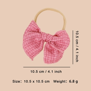 Détail du nœud en tweed rose avec dimensions et bandeau élastique sans couture souple