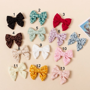 Set di 13 fermagli per capelli a fiocco per bambine in tessuto goffrato multicolore