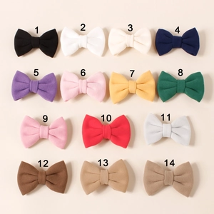 Detailed grid view of 14 colorful cashmere-style bow hair clips for girls