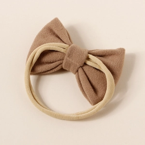 Brown soft faux cashmere bow on beige nylon headband for babies and infants