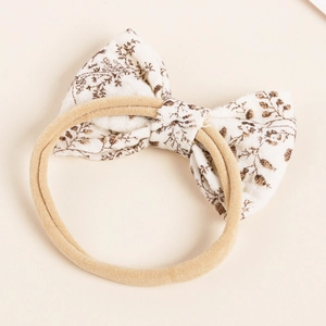 Baby-Haarband mit Baumwoll-Schleife und Blumenmuster sowie weichem Nylonband