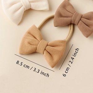 Neutral solid color faux cashmere bow headbands with elastic nylon bands for infants