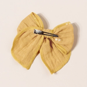 Floral yellow cotton bow hair clip with silver metal alligator clip on back