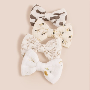 Lot de quatre barrettes à nœuds en coton aux motifs floraux et vache pour petites filles