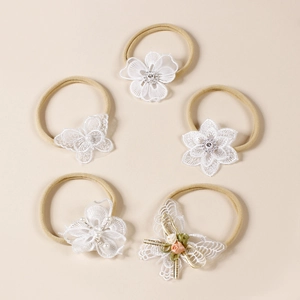 Lot de 5 bandeaux pour bébé avec fleurs en dentelle blanche et nœuds sur nylon souple