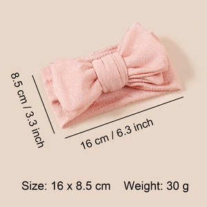 Bandeau bébé rose avec nœud, dimensions 16x8,5 cm et texture en maille de jacquard
