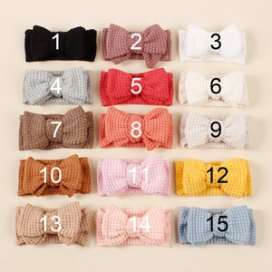Detailed grid view showing 15 colorful waffle knit bow headbands for baby girls
