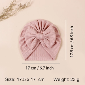 Pink ribbed knit baby turban hat with oversized bow, size 17.5x17cm and 23g weight
