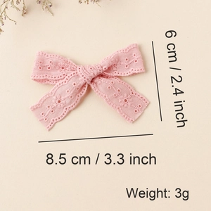 Detailed size view of a pink lace bow hair clip measuring 8.5cm x 6cm and weighing 3g