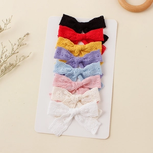 Set of 8 cute children's lace embroidered bow hair clips in assorted colors for girls
