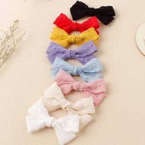 8-piece set of girls' floral embroidered lace bow hair clips in various vibrant colors