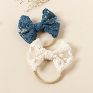 Lace butterfly bow nylon headbands for babies in blue and cream white colors
