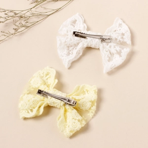 Embroidered lace bow hair clips for girls featuring floral patterns and metal alligator clips