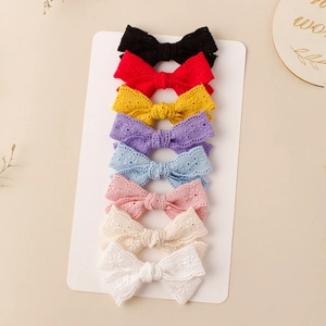 8-piece set of girls' floral lace bow hair clips in assorted colors for summer