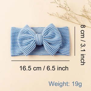 Bandeau bébé à rayures bleues et blanches avec grand nœud, dimensions 16,5x8cm et poids 19g