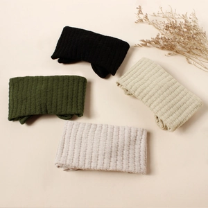Handmade waffle knit baby bow headbands in black, green, khaki, and gray colors