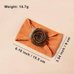 Detaillierte Größenangaben für orangefarbenes Baby-Stirnband mit brauner Satin-Rose