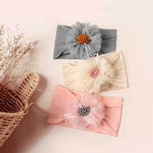 Set of three elastic jacquard nylon baby headbands with large lace flowers and ribbons