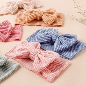 Bandeaux pour bébé multicolores avec grands nœuds et texture côtelée élastique