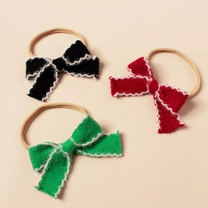 Lot de trois bandeaux pour bébé avec nœuds tricotés en rouge, noir et vert
