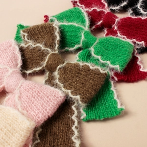 Fermagli per capelli a fiocco in maglia fatti a mano in vari colori con texture morbida e bordo