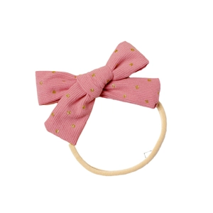 Bandeau bébé en velours côtelé rose avec pois dorés et cordon en nylon élastique