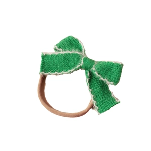 Bandeau bébé avec nœud tricoté vert, bordure en fourrure blanche et nylon doux