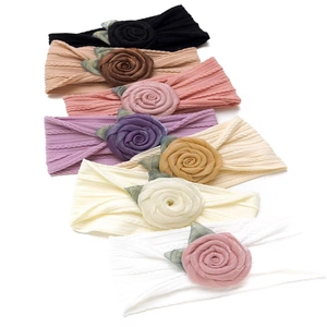 Elastische Baby-Stirnbänder aus Nylon mit Jacquard-Rosen in sieben verschiedenen Farben
