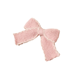 Fermaglio per capelli a fiocco rosa in maglia per bambina con bordo bianco ondulato