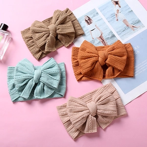 Bandeau bébé en nylon avec double nœud jacquard en kaki, orange, vert et rose pâle