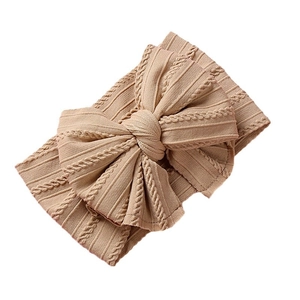 Bandeau bébé en nylon souple avec un nœud jacquard double épaisseur de couleur thé au lait