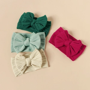 Nylon baby headband set with double-layered bows in four soft colors for infants