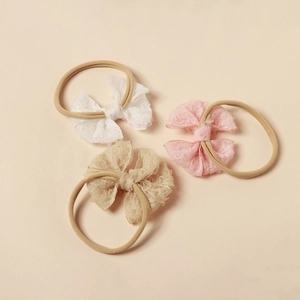 Set mit drei Baby-Stirnbändern mit Spitzenschleife in Weiß, Rosa und Beige, elastisch