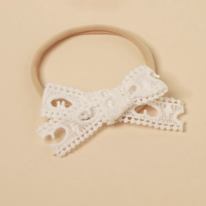 Detail of soft lace hollow bow hairband with high elastic nylon band for infant girls