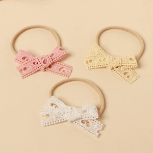 Set of 3 baby headbands with lace heart bows in pink, yellow and white colors