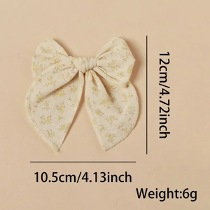 Fermaglio per capelli con stampa floreale in cotone beige con piccoli fiori gialli