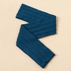 Detailed macro view of peacock blue cable knit nylon fabric texture for baby headbands
