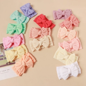 Set of 16 colorful baby nylon headbands with large double jacquard bows for infants