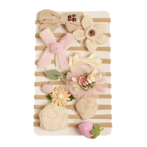 Lot de 10 bandeaux bébé avec fleurs en dentelle et nœuds en tissu sur carte